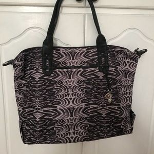 Stella and Dot “how does she do it” bag